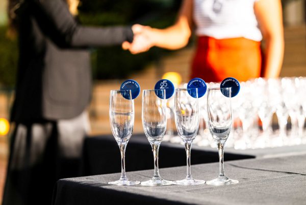 Corporate event management professionals collaborating onsite to plan and deliver a successful business event